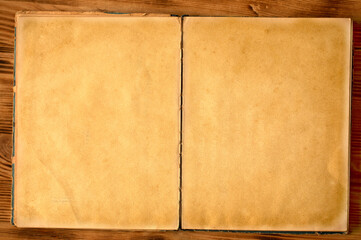 Old shabby book with yellow paper from time to time. Reversal.