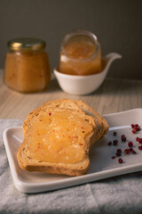 breakfast food with yellow toast and marmalade