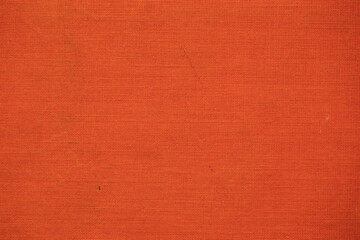 Orange fabric, old book cover, texture or background.