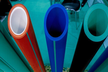 Cross-section of multicolored large diameter plastic pipes