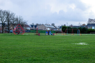 Obraz na płótnie Canvas Children's playground on the green meadow