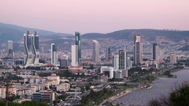 Izmir, Turkey - September 26, 2021: Evening Landscape footage of Izmir bay. Folkart towers, Mistral tower, Ege Perla and the other skyscrapers in the scene.