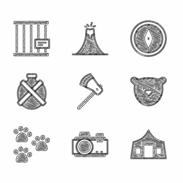 Set Wooden axe, Photo camera, Tourist tent, Tiger head, Paw print, Canteen water bottle, Compass and Animal cage icon. Vector