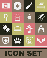 Set Deer antlers, Winter hat, Hockey puck, Paddle, Inukshuk, Wooden axe, Flag of Canada and TV CN Tower Toronto icon. Vector