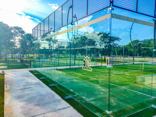 Tennis and paddle court inside a private residential area
