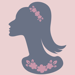 an elegant female head in profile with jewelry - a banner for advertising jewelry or a postcard. Design element