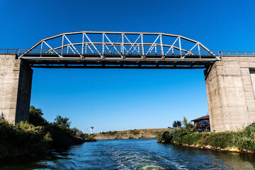 Landscape with the bridge at the entrance in the Limanu lake area, near the harbor. Constanta, Romania.