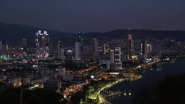 Izmir, Turkey - September 26, 2021: Night Landscape footage of Izmir bay. Folkart towers, Mistral tower, Ege Perla and the other skyscrapers in the scene.