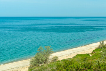 Fototapeta premium Seashore in spring. Picturesque shoreline