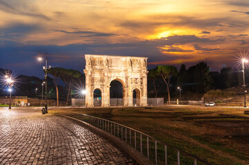 The Triumphal Arch of Constantine in twilight, Rome, Italy