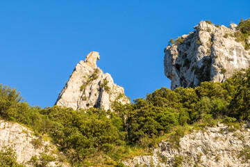 The rocks above the Pont dArc in the Gorges de lArdeche in Europe, France, Ardeche, in summer, on a sunny day.