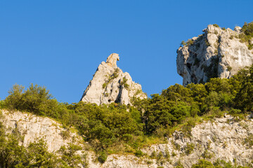 The rocks of Pont dArc in the Ardeche gorges in Europe, France, Ardeche, in summer, on a sunny day.