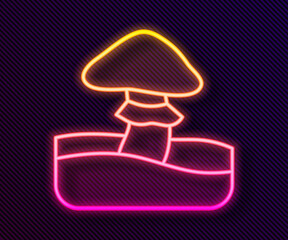 Glowing neon line Mushroom icon isolated on black background. Vector