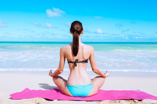 Meditation, yoga, on the beach feeling at peace