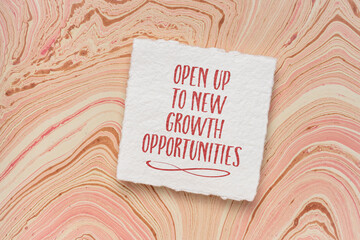 open up to new growth opportunities - inspirational handwriting on a watercolor paper, career, lifestyle and personal development concept