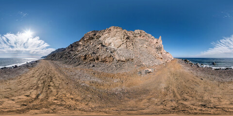 full seamless spherical hdr 360 panorama view on road along coast of sea high in sandy mountains with white clouds in equirectangular projection, ready for VR AR virtual reality