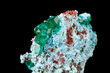 macro mineral stone Dioptase on a black background