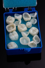 Special Blue Case with Dental Crowns Ceramics on Black Background