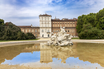 Turin, Italy, the park of the royal palace, the fountain with sculptures, the reflection in the...
