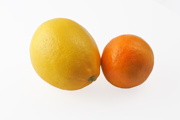 Lemon and tangerine on an isolated white background.