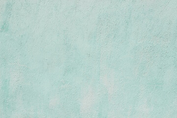 turquoise wall painted in plaster