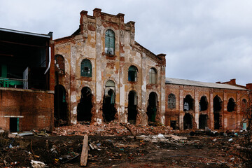 Demolished abandoned old red brick industrial building