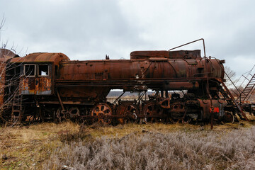 Naklejka premium Old rusty abandoned steam locomotive
