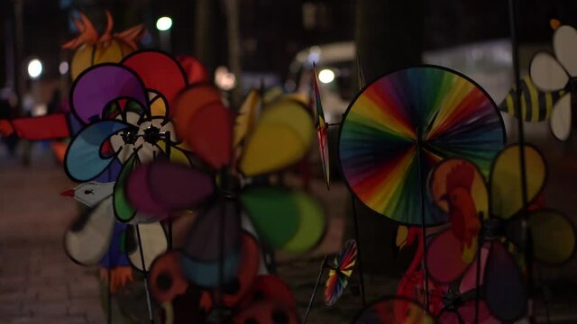 colourful pinwheels toys at night