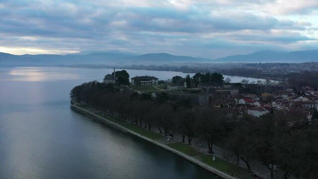 Aerial view of Ioannina city in Greece, Aslan Pasha Tzami, the lake with the island of Kyra Frosini or nissaki.