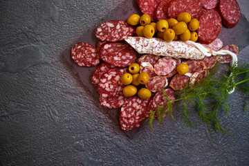 delicious sausage, olives, dill background