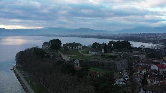 Aerial view of Ioannina city in Greece, Aslan Pasha Tzami, the lake with the island of Kyra Frosini or nissaki.
