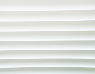 Texture of horizontal closed white blinds. Background.