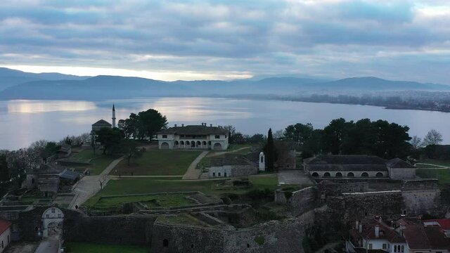 Aerial view of Ioannina city in Greece, Aslan Pasha Tzami, the lake with the island of Kyra Frosini or nissaki.