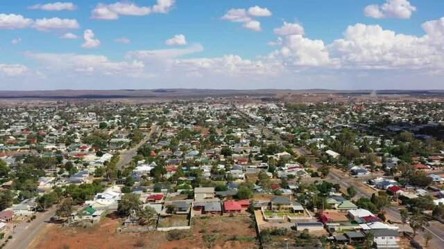 Outskirt of Broken Hill city in aerial flying over streets and houses as 4k.

