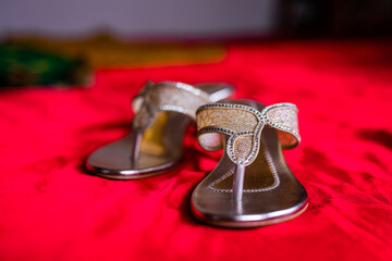 Indian bride's wedding shoes close up