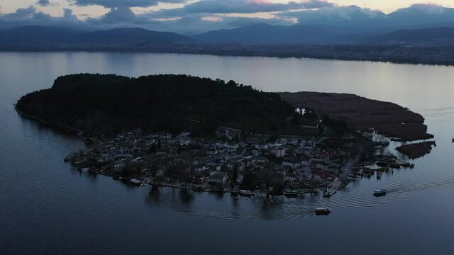 Aerial view of Ioannina city in Greece, Aslan Pasha Tzami, the lake with the island of Kyra Frosini or nissaki.