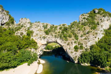 The panoramic view from Pont dArc in the Ardeche gorges in Europe, France, Ardeche, in summer, on a sunny day.