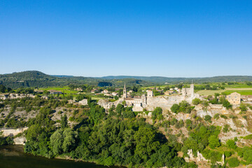 Fototapeta na wymiar The town of Aigueze and its countryside in Europe, France, Ardeche, in summer, on a sunny day.