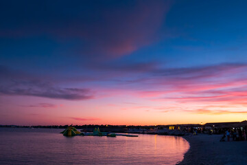 Sea and beach on beautiful blue and purple sunset