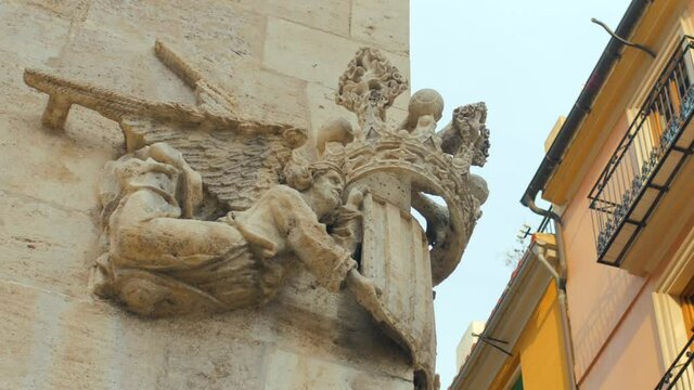 Valencia, Spain - January 2022. Royal Arms Of Kingdom of Valencia Stone Sculpture On Facade Of Lonja de la Seda (Silk exchange).