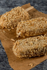 ice cream popsicle on gray background with ice