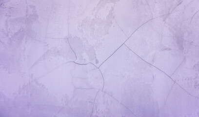 The cement wall surface has cracks for background or illustration.