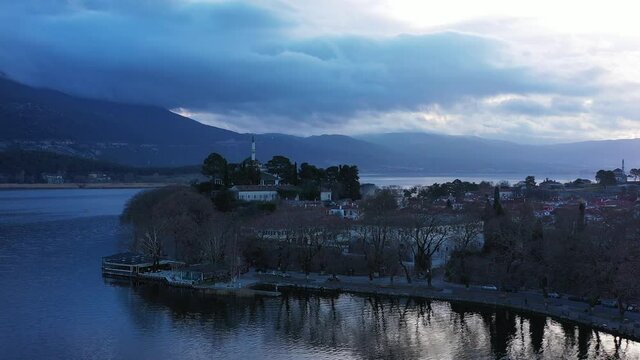 Aerial view of Ioannina city in Greece, Aslan Pasha Tzami, the lake with the island of Kyra Frosini or nissaki.