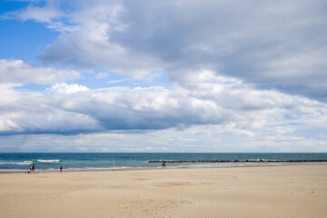 The fine sand beach of the city of Agde in Europe, France, Occitanie, Herault, in summer, on a sunny day.