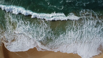 Crashing Waves on Hawaii Beach Bird's eye view drone