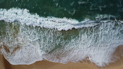 Crashing Waves on Hawaii Beach Bird's eye view drone