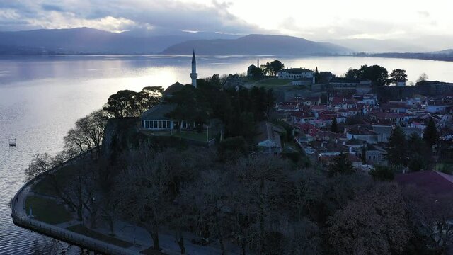 Aerial view of Ioannina city in Greece, Aslan Pasha Tzami, the lake with the island of Kyra Frosini or nissaki.