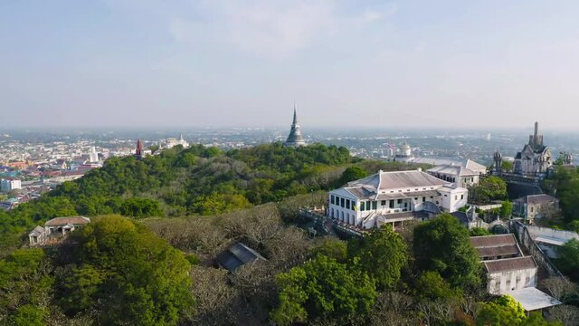 Aerial top view of Phra Nakhon Khiri Historical Park or Khao Wang, Phetchaburi urban city town with forest trees and green mountain hills. Nature landscape background, Thailand.