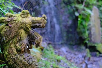 Waterfall and dragon statue