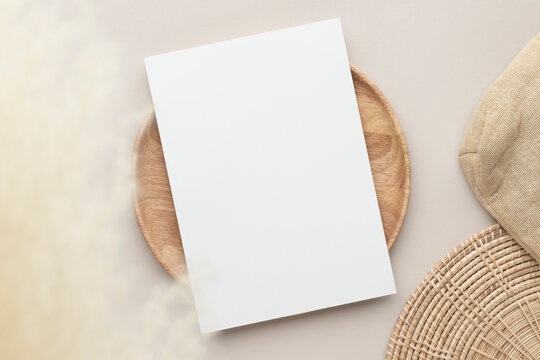 Blank paper cards, Mockup with pampas grass on a wooden plate, beige background, Minimal beige workplace composition, flat lay, mockup